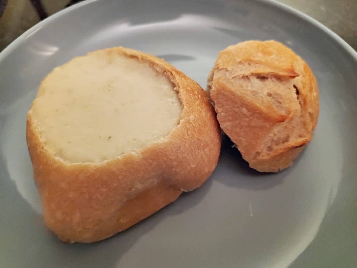 https://honestandtruly.com/wp-content/uploads/2022/01/Cream-of-celery-soup-in-a-sourdough-bread-bowl-on-a-blue-soup.jpg