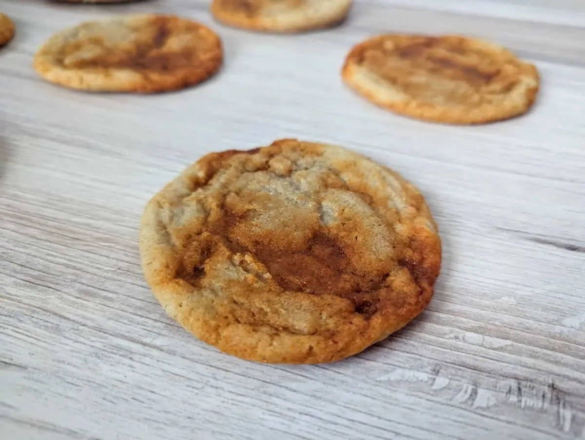 Close up of a gochujang cookie with more in the background.