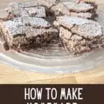 Image shows a Plate of brownies with text how to make homemade cherry brownies.