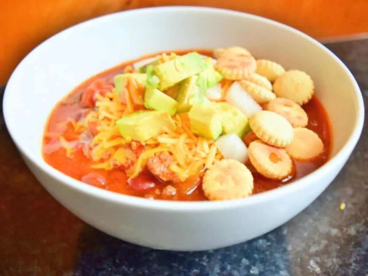 Image shows a closeup of a bowl of Crockpot beef chili.