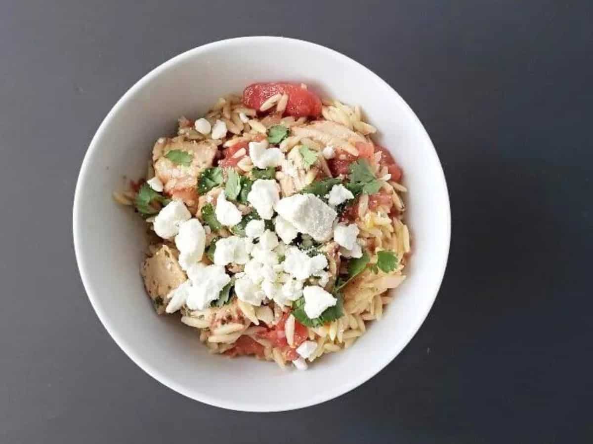 Image shows an overhead shot of Image shows in a white bowl and a black background.