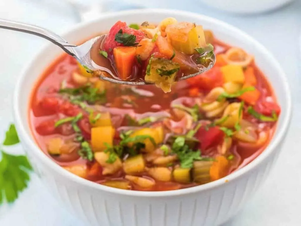 Image shows delicious minestrone soup.