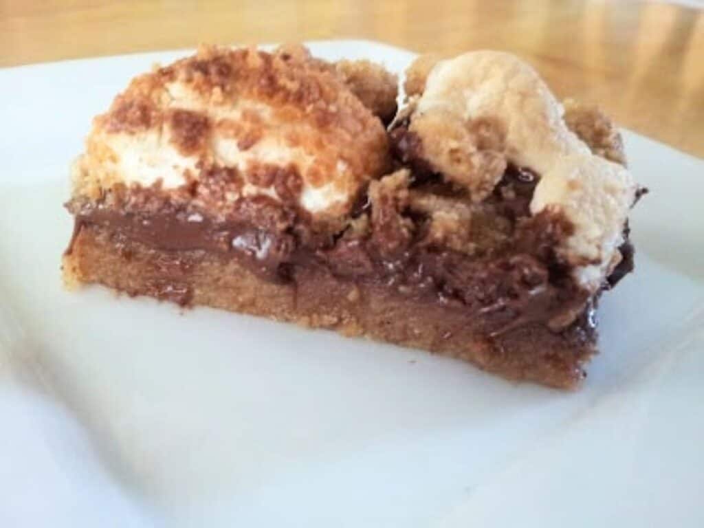 Image shows irresistible chewy smores bar.