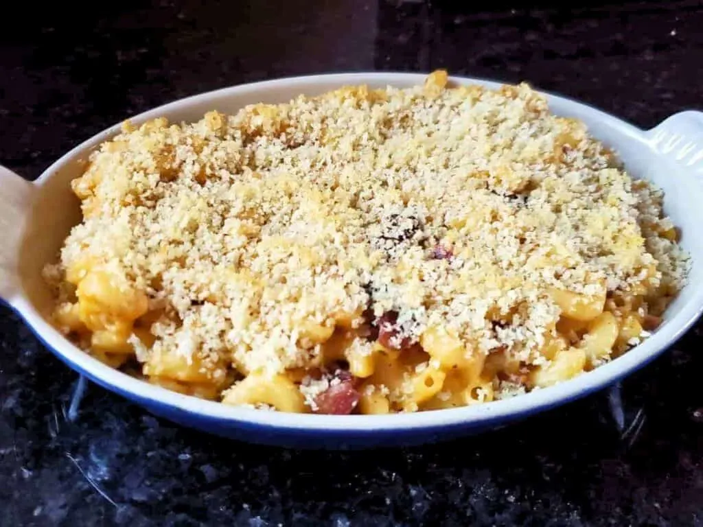 Image shows irresistible mac and cheese in a casserole.