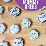 Image shows an Overhead of oreo mummies with text easy and cute treat halloween mummy oreos.