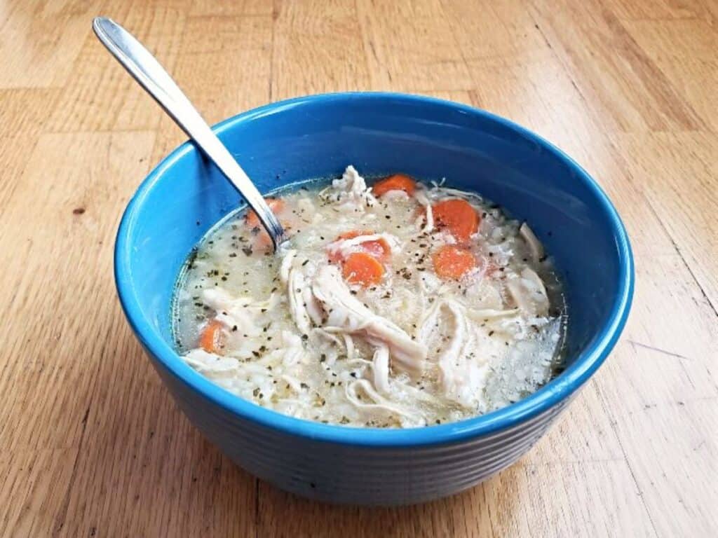 Image shows yummy chicken and rice soup.