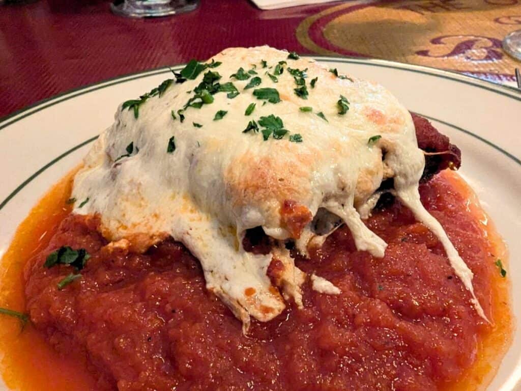 Image shows a plate with eggplant rollatini.